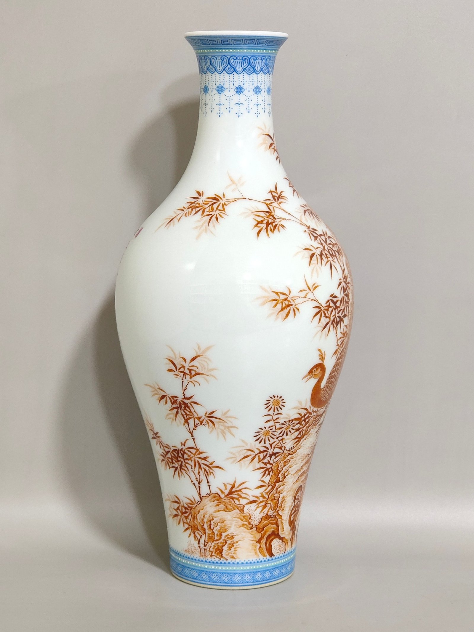 Qing Dynasty Yongzheng alum red emerald edge peacock bamboo poem inscribed olive vase