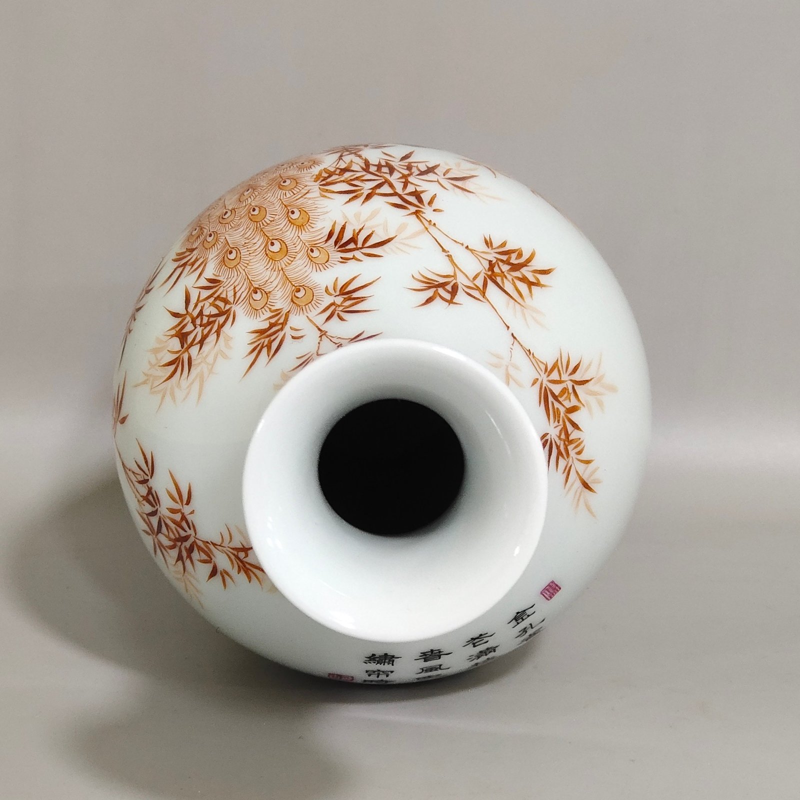 Qing Dynasty Yongzheng alum red emerald edge peacock bamboo poem inscribed olive vase
