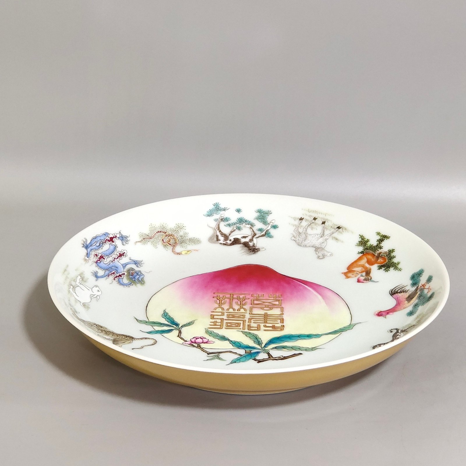 Qing Dynasty Yongzheng beige glaze twelve zodiac signs longevity plate