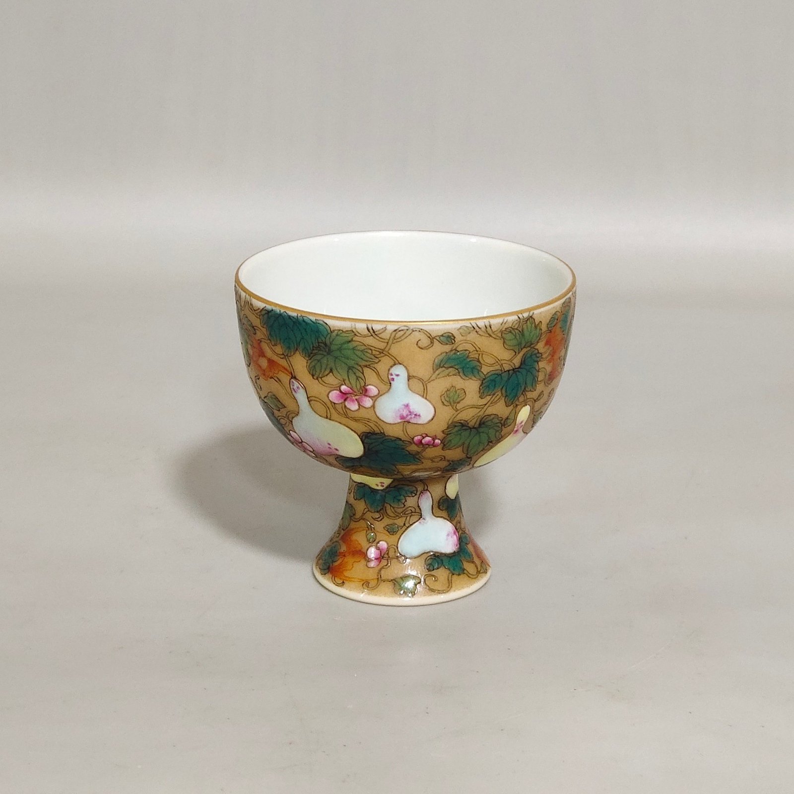 Qing Dynasty Yongzheng beige glazed Goblet with many children and many blessings