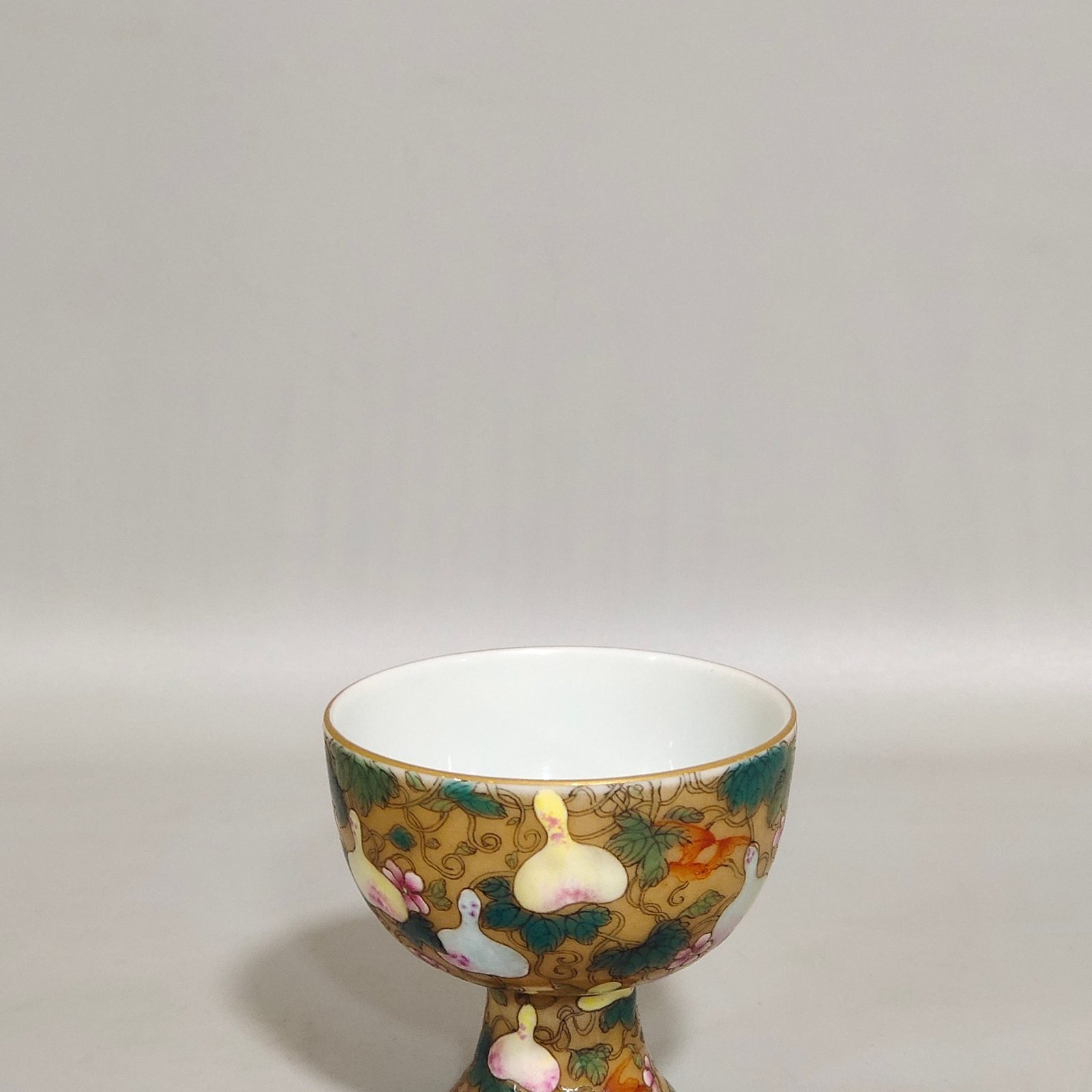 Qing Dynasty Yongzheng beige glazed Goblet with many children and many blessings