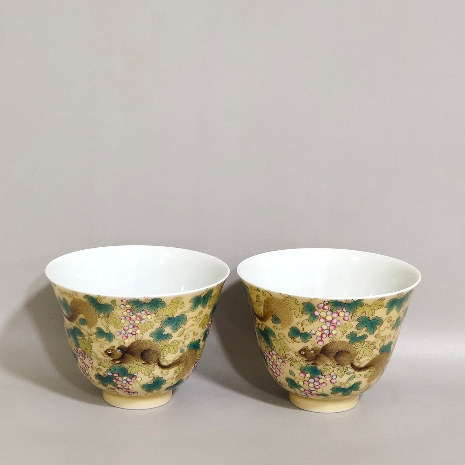 Qing Dynasty Yongzheng beige glazed squirrel grape cup