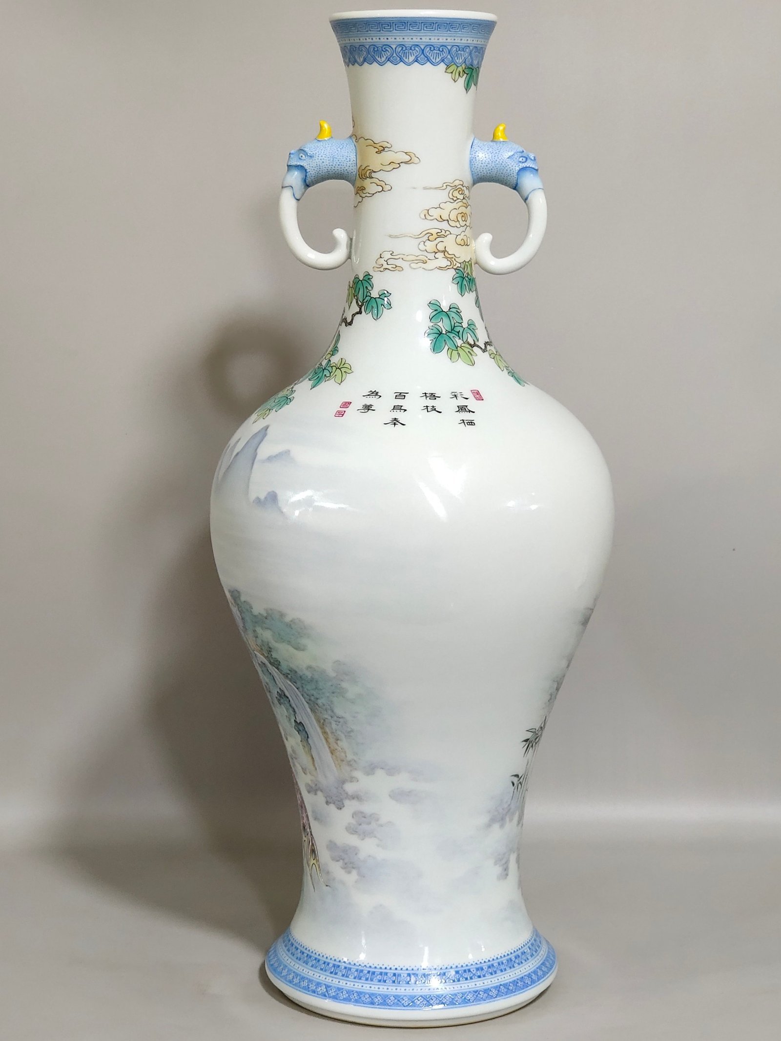 Qing Dynasty Yongzheng green edge phoenix poem elephant ear vase