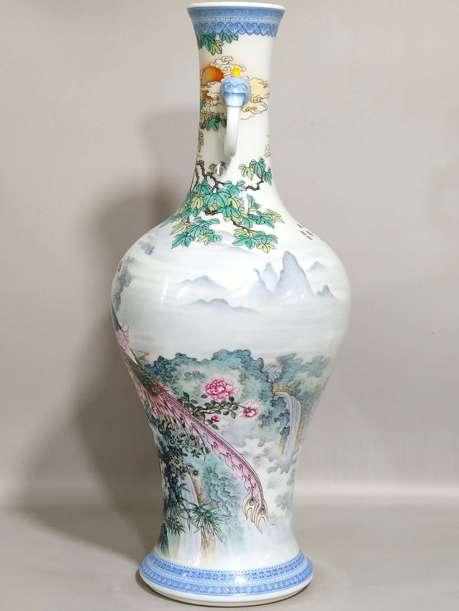 Qing Dynasty Yongzheng green edge phoenix poem elephant ear vase