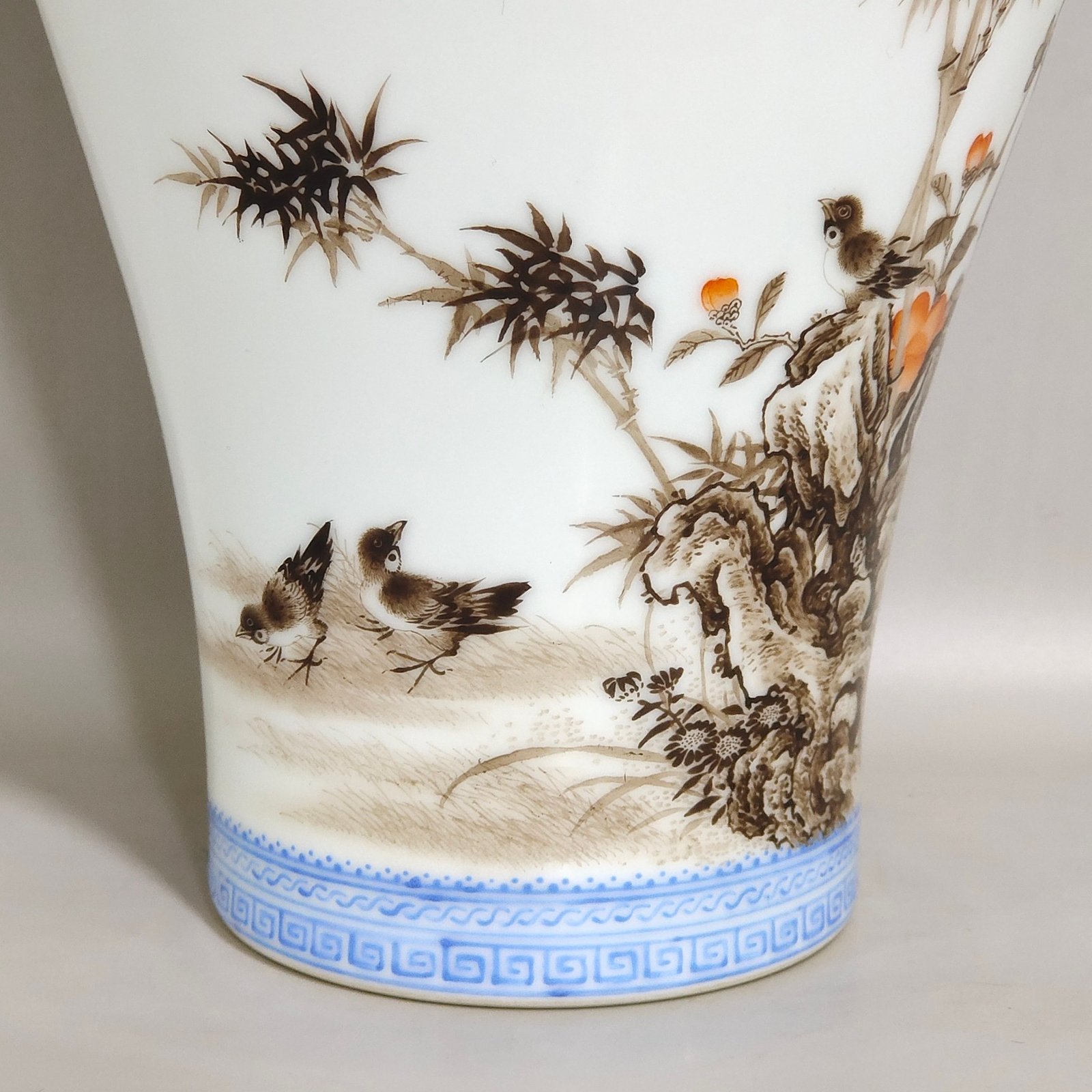 Qing Dynasty Yongzheng green edged ink colored plum vase with plum and bamboo