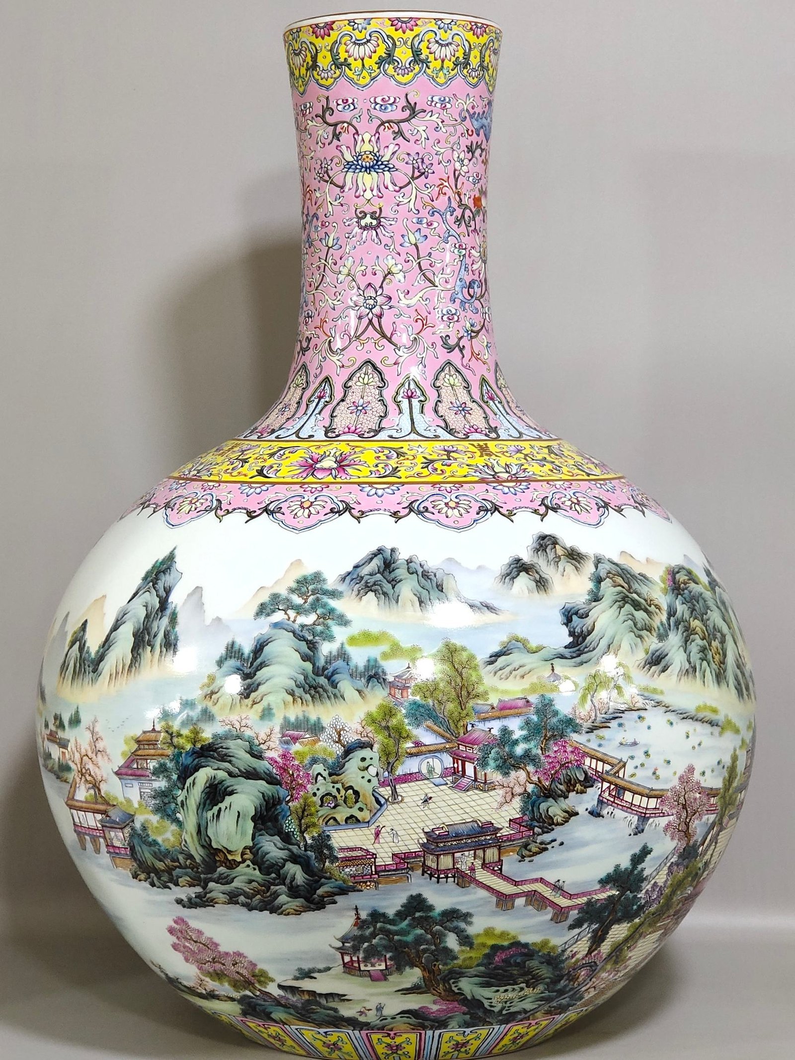 Qing Dynasty Yongzheng rouge powder land blessing and longevity landscape celestial sphere vase