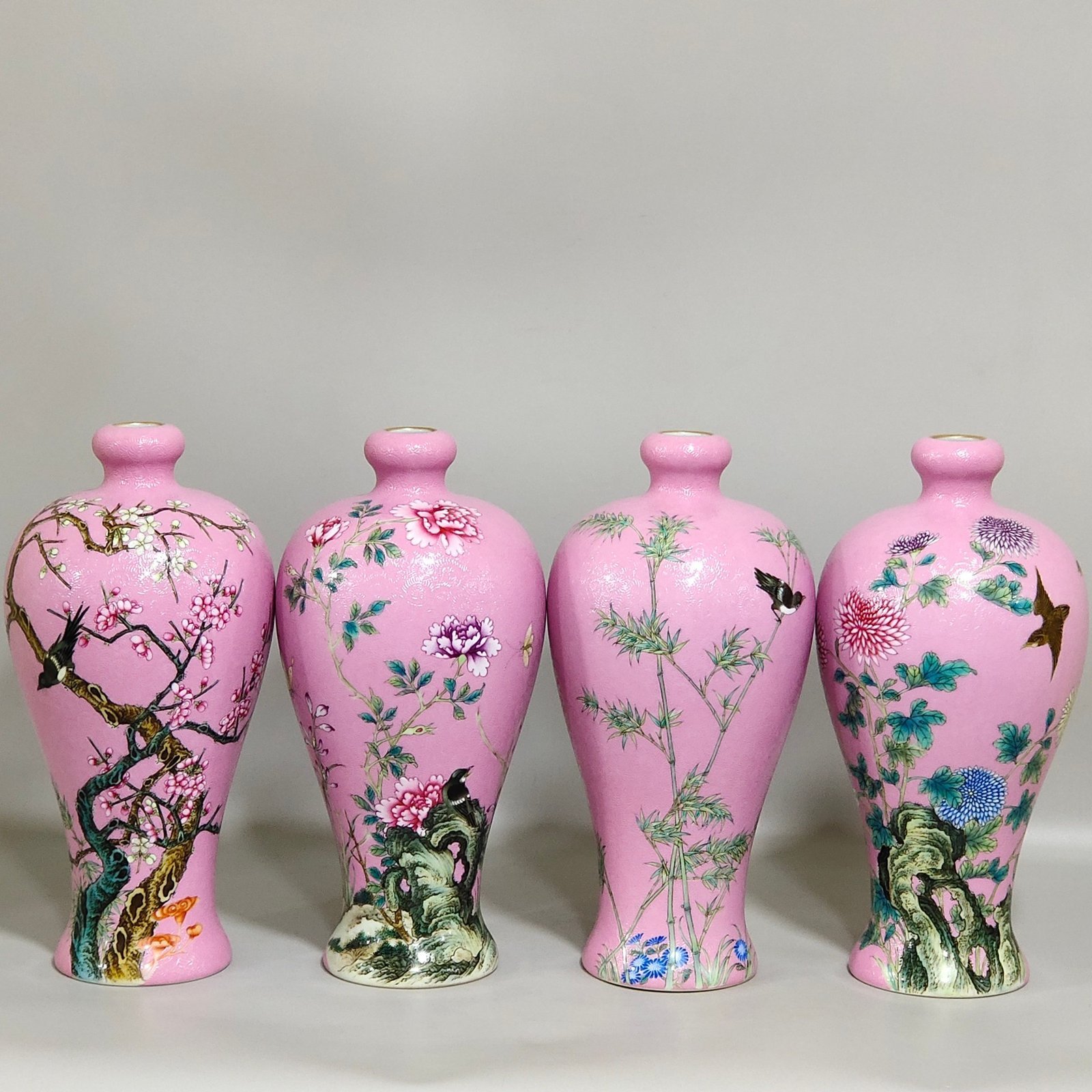 Qing Dynasty Yongzheng rouge pink plum vase with four seasons flowers and birds inscribed with poems