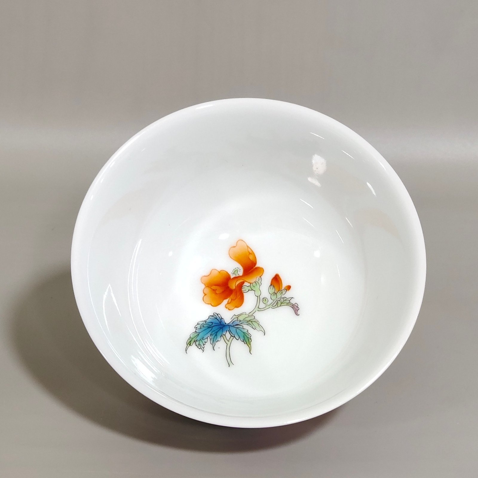 Qing Dynasty Yongzheng rouge red painted twelve flower god cup