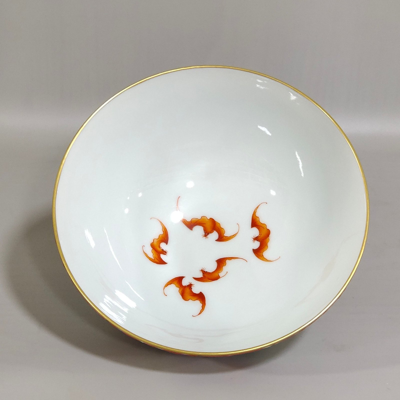 Qing Dynasty Yongzheng rouge ground blessing and longevity pine bamboo and plum bowl