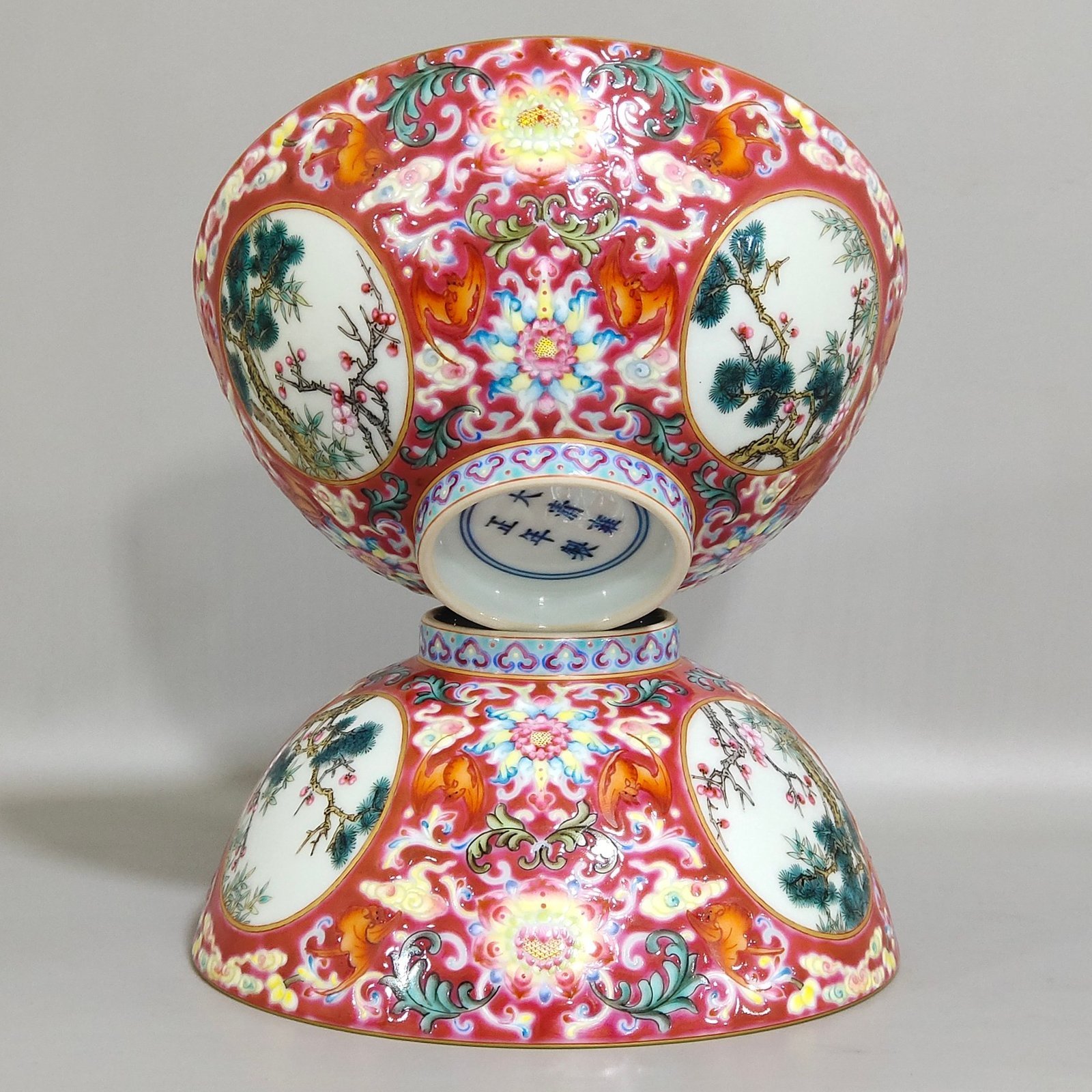 Qing Dynasty Yongzheng rouge ground blessing and longevity pine bamboo and plum bowl