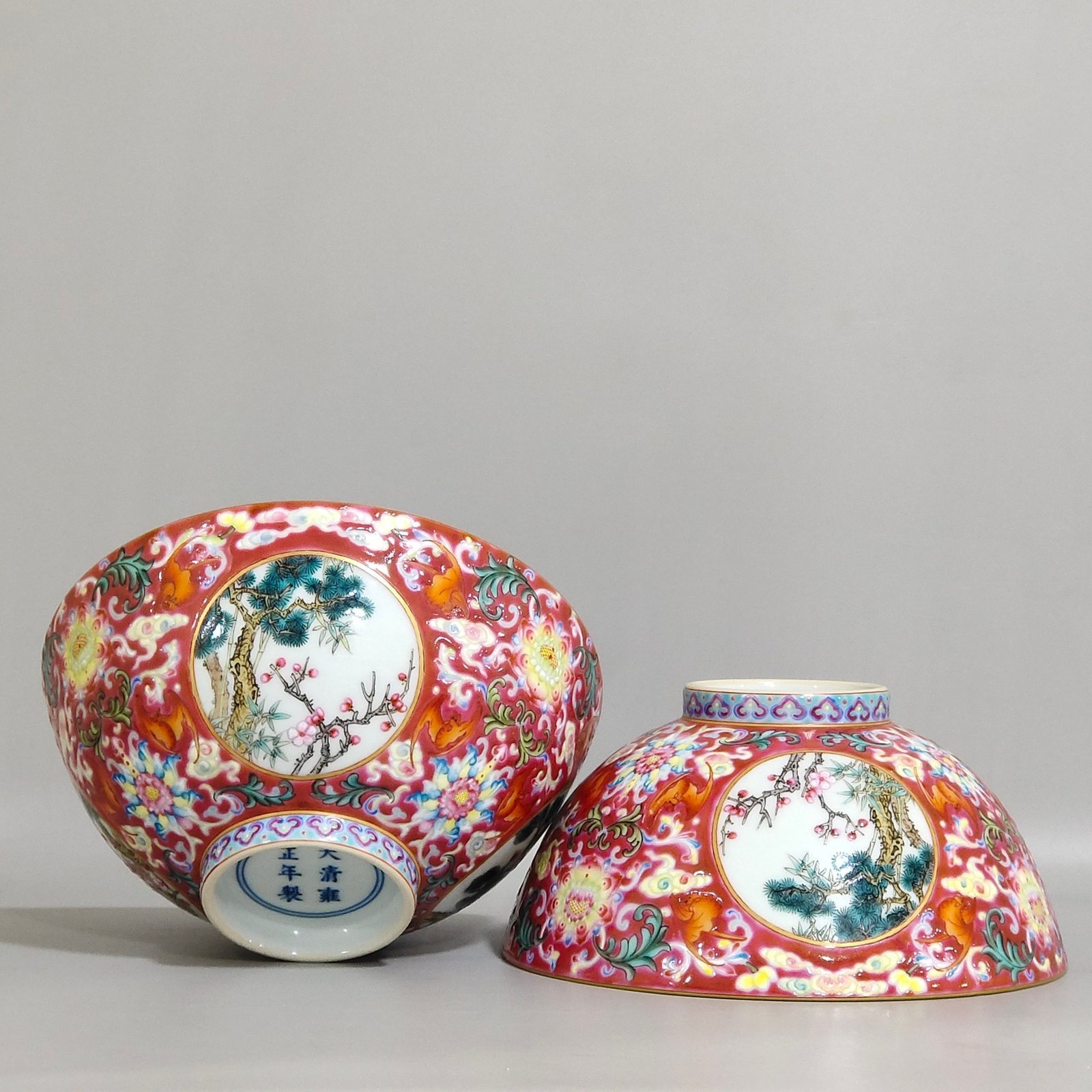 Qing Dynasty Yongzheng rouge ground blessing and longevity pine bamboo and plum bowl