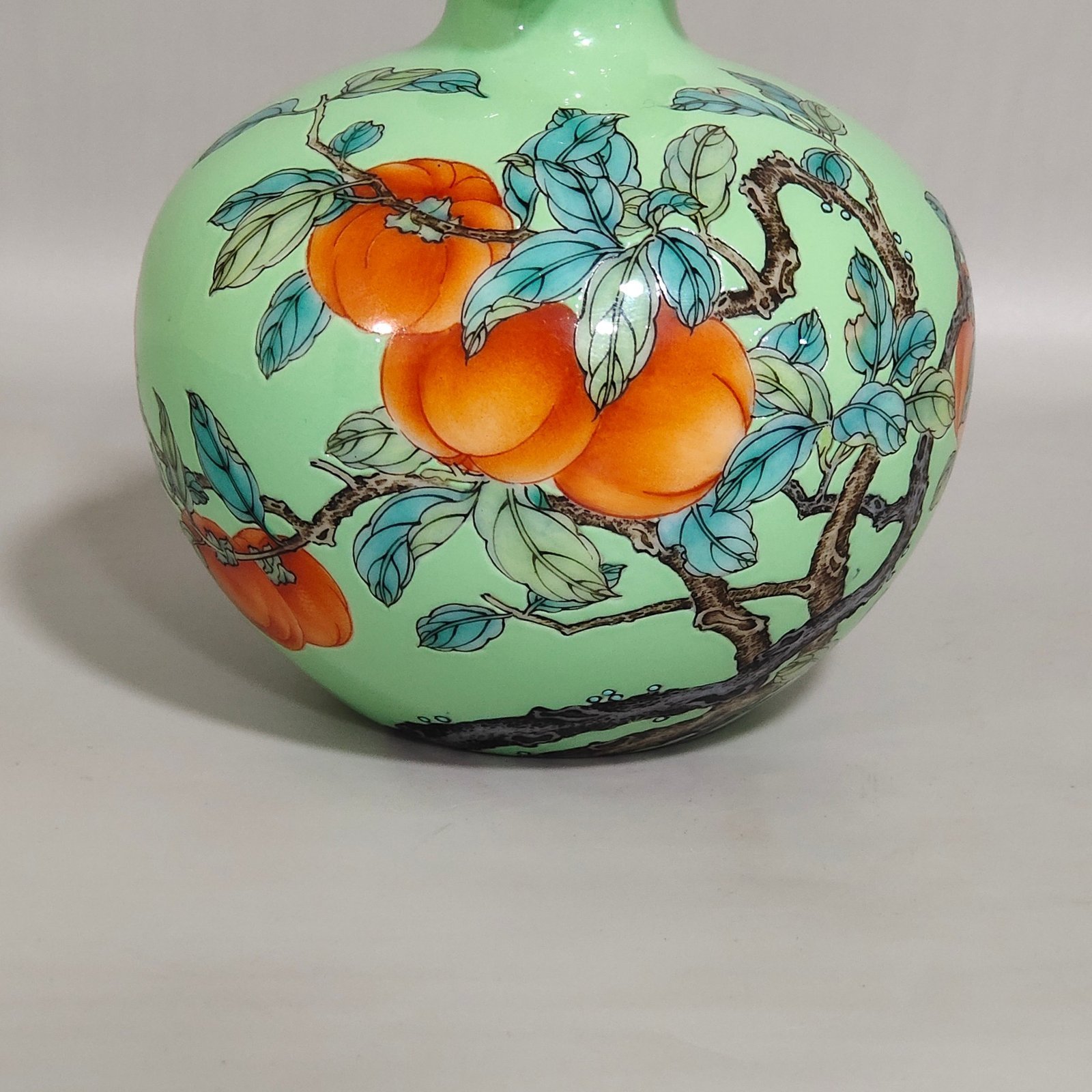 Qing Dynasty Yongzheng A green-glazed apple persimmon and pomegranate statue