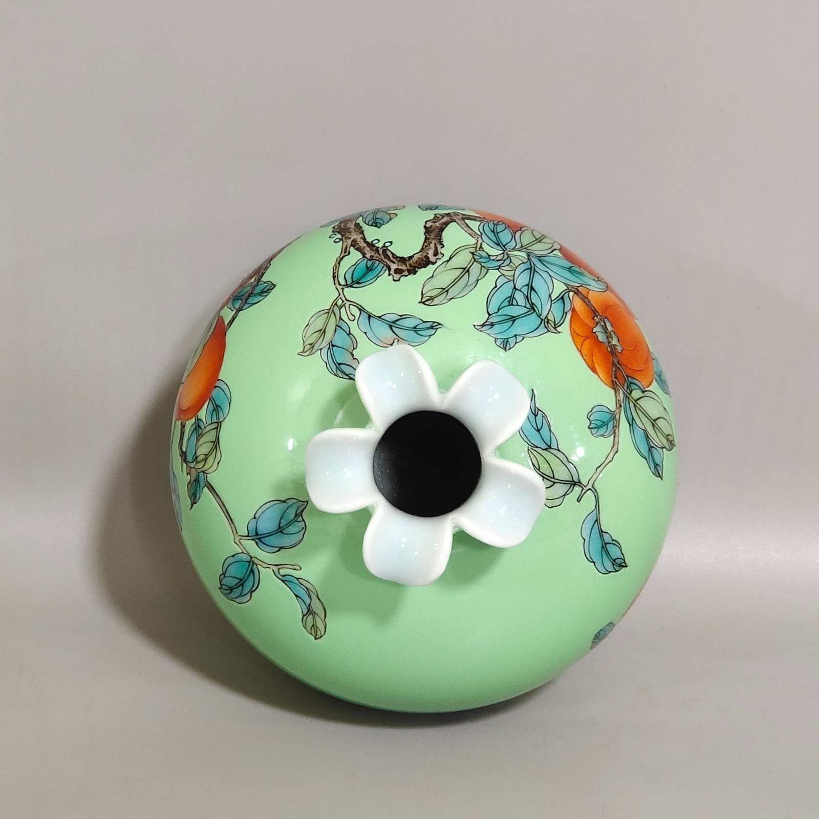 Qing Dynasty Yongzheng A green-glazed apple persimmon and pomegranate statue