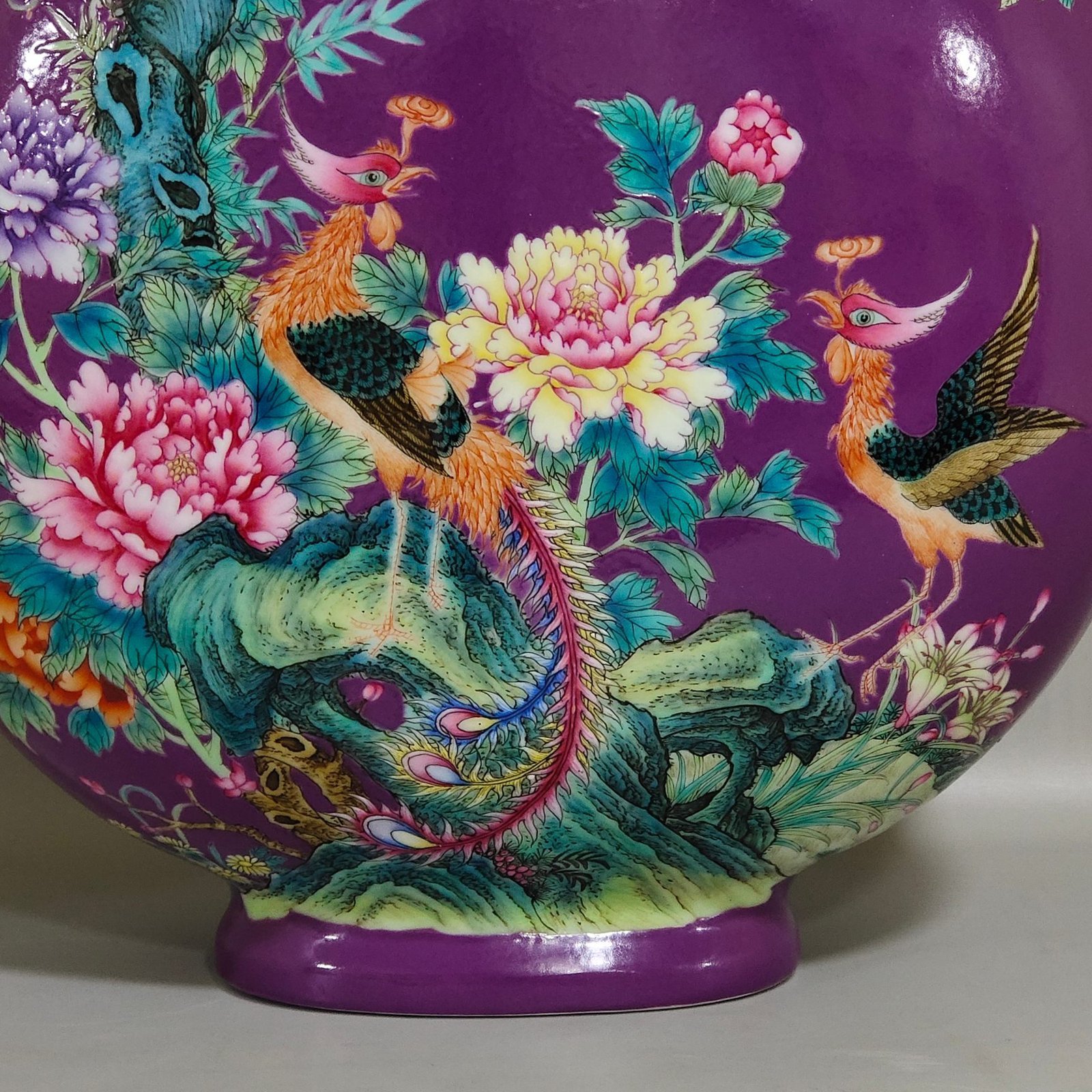 Qing Dynasty Yongzheng eggplant skin purple glaze Phoenix peony flower holding moon vase