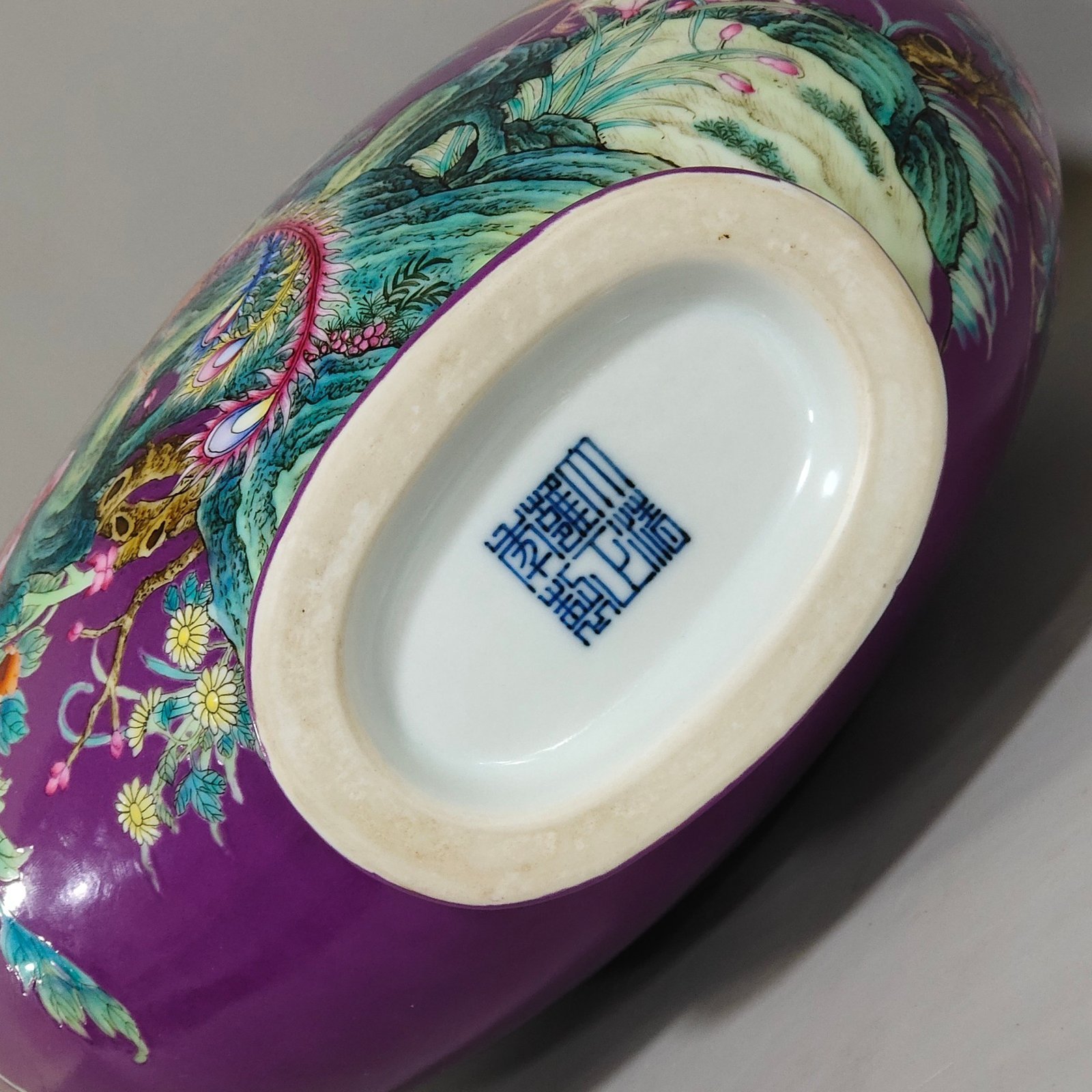 Qing Dynasty Yongzheng eggplant skin purple glaze Phoenix peony flower holding moon vase