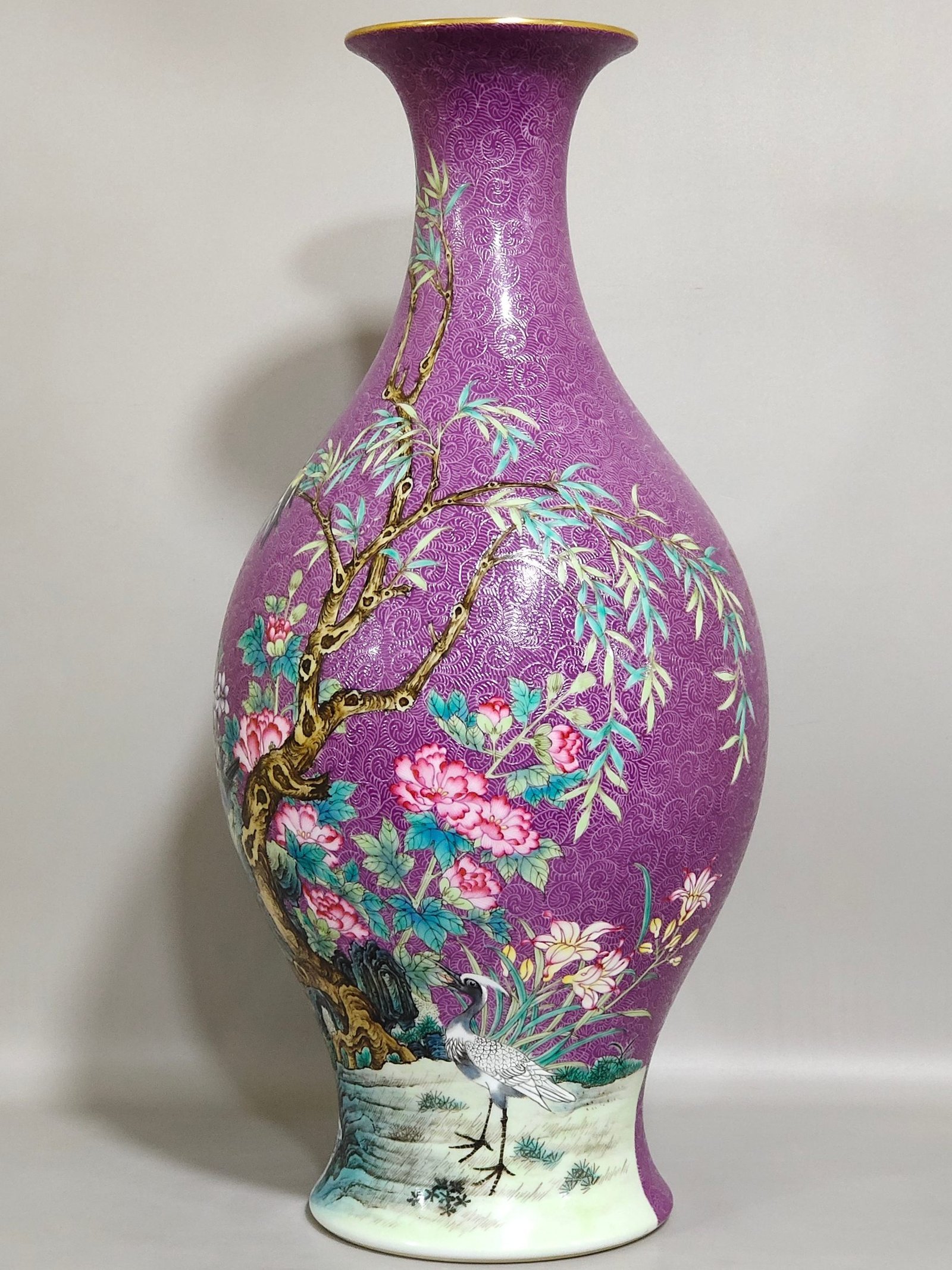 Qing Dynasty Yongzheng purple-glazed eggplant skin olive vase with flowers and birds