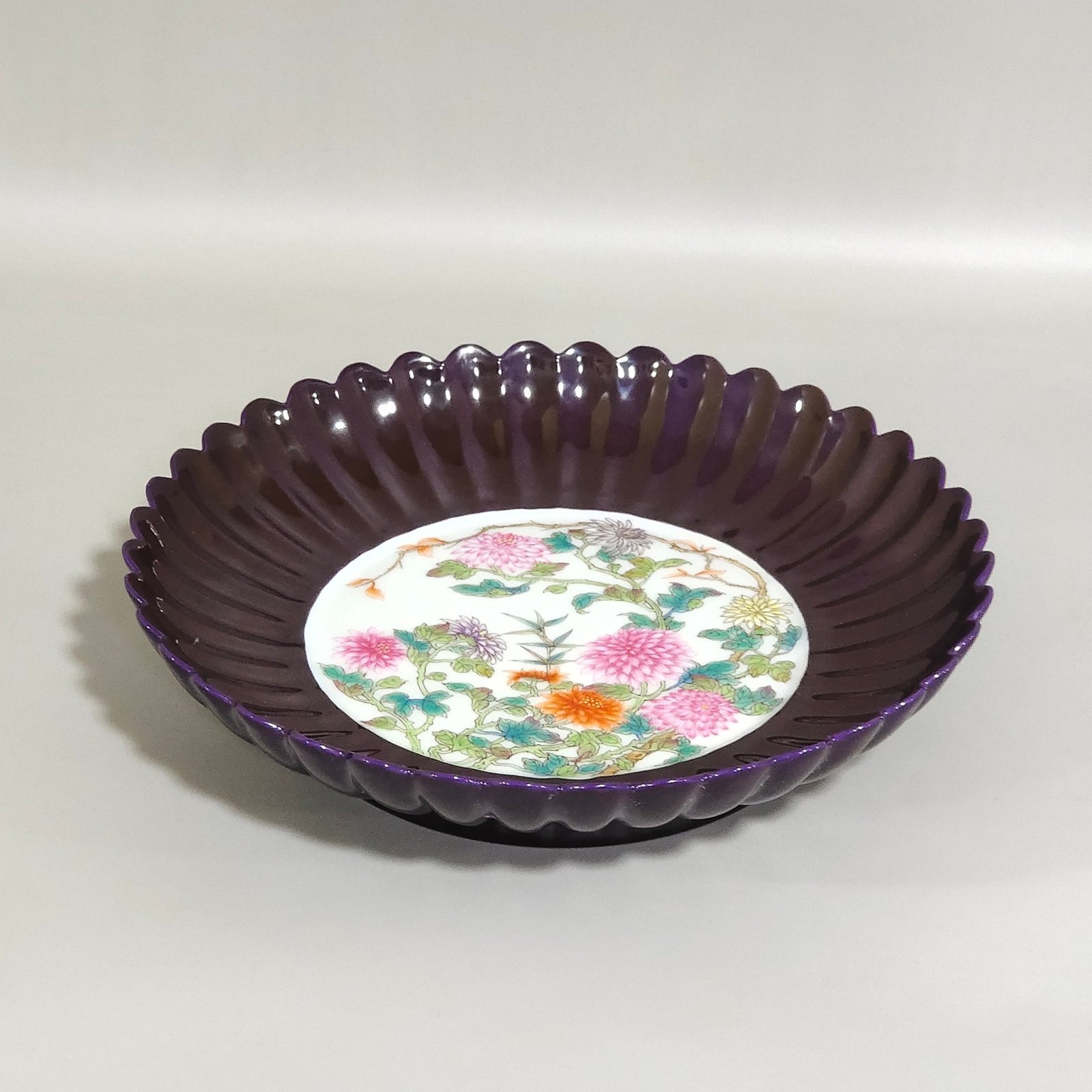 Qing Dynasty Yongzheng purple-glazed eggplant-ribbed four-season flower dish