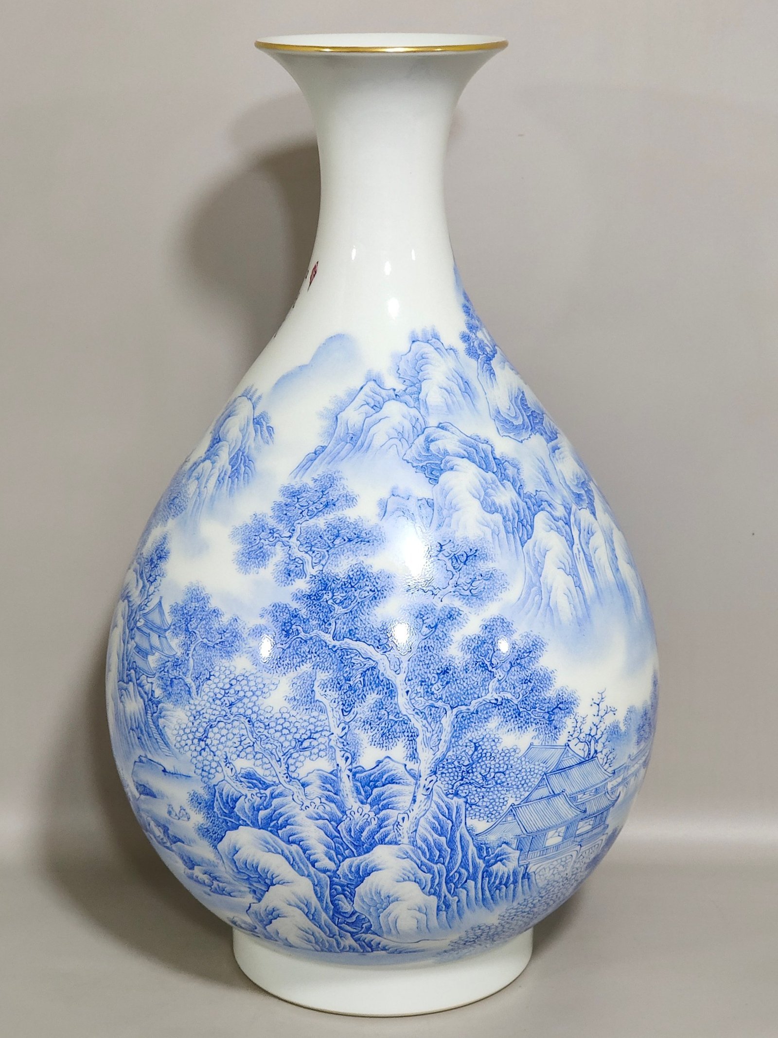Qing Dynasty Yongzheng blue material landscape poem jade pot spring vase