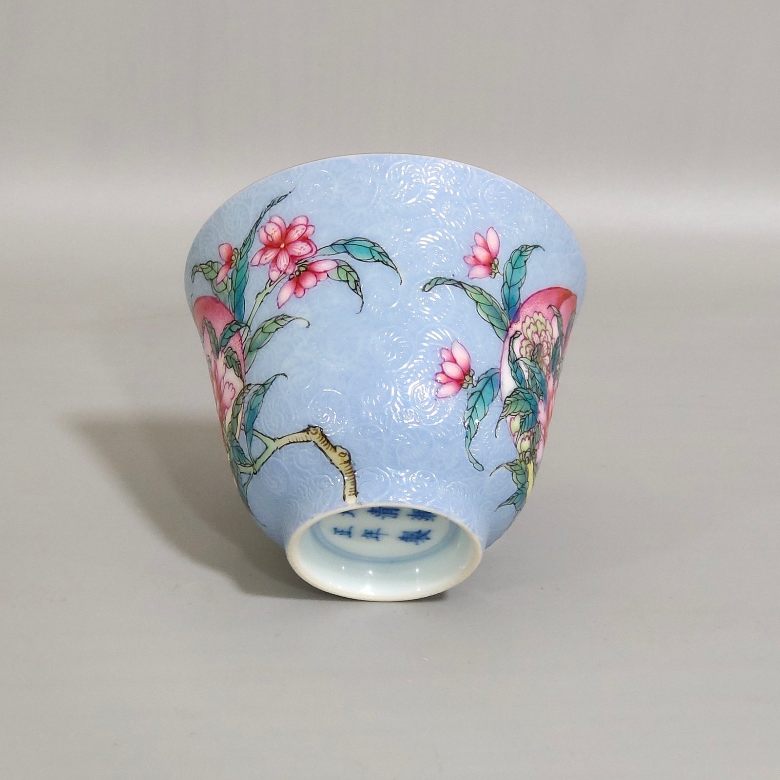 Qing Dynasty Yongzheng blue glaze peach flower cup