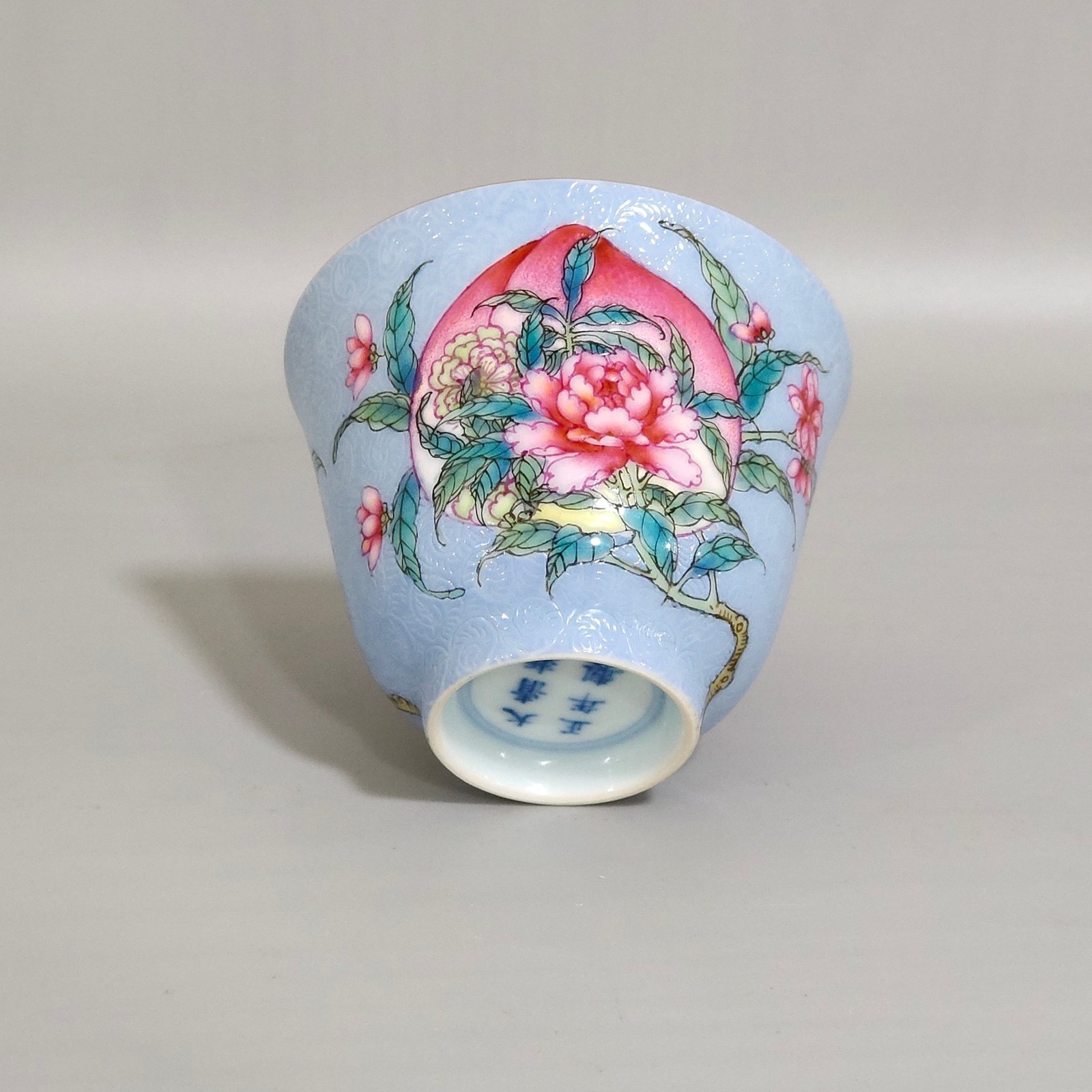 Qing Dynasty Yongzheng blue glaze peach flower cup