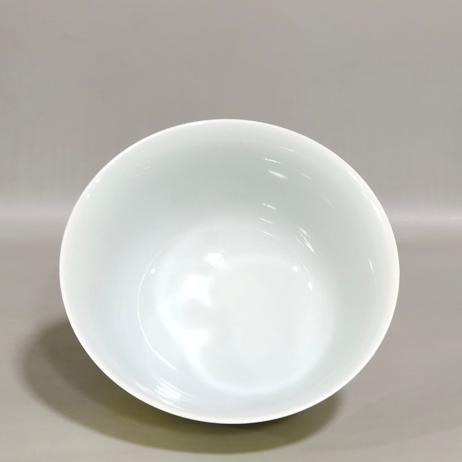 Qing Dynasty Yongzheng yellow ground green color Wanshou pattern tea bowl