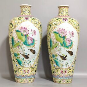 Qing Dynasty Yongzheng yellow ground mandarin duck lotus plum vase