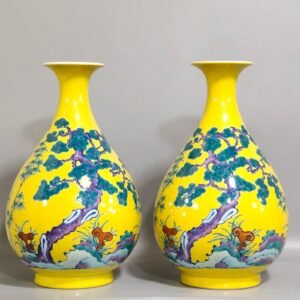 Qing Dynasty Yongzheng yellow glaze Suihan Sanyou pine bamboo plum and jade pot and spring vase