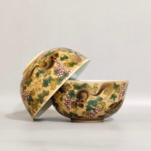 Qing Dynasty Yongzheng yellow-glazed squirrel grape cup