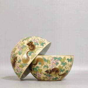 Qing Dynasty Yongzheng yellow-glazed squirrel grape cup