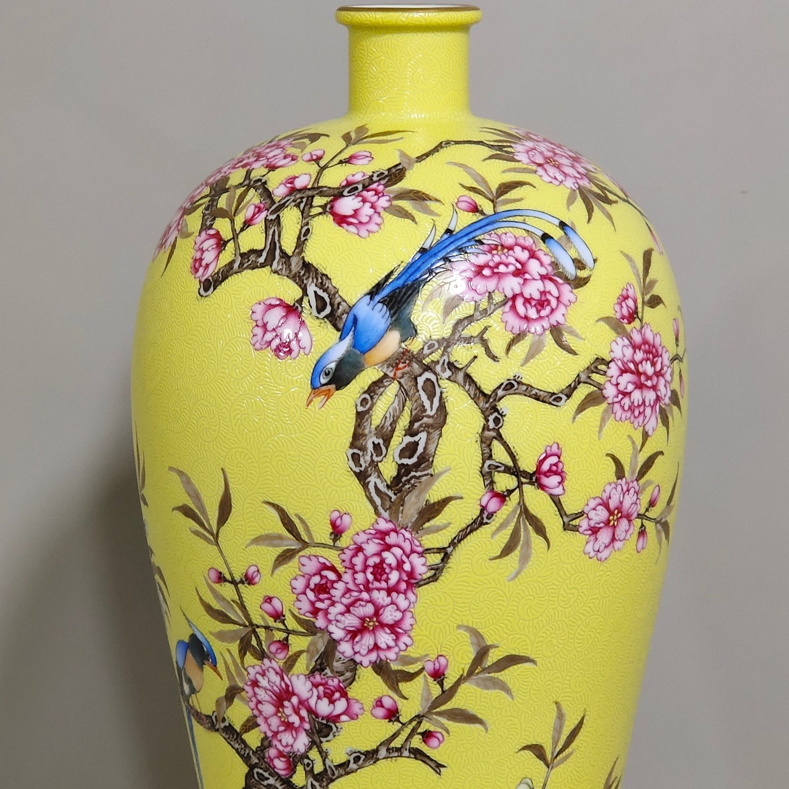 Qing Dynasty Yongzheng yellow glaze rolled plum vase with flowers and birds inscribed with poems