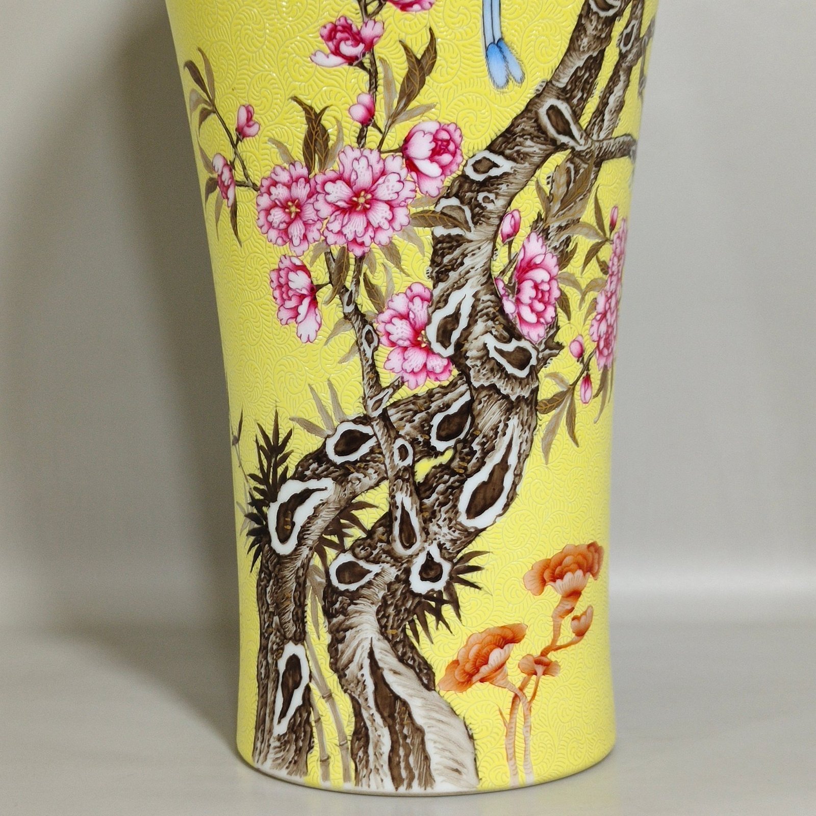 Qing Dynasty Yongzheng yellow glaze rolled plum vase with flowers and birds inscribed with poems