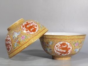 Qing Dynasty Guangxu A pair of yellow and pastel windowed dragon bowls
