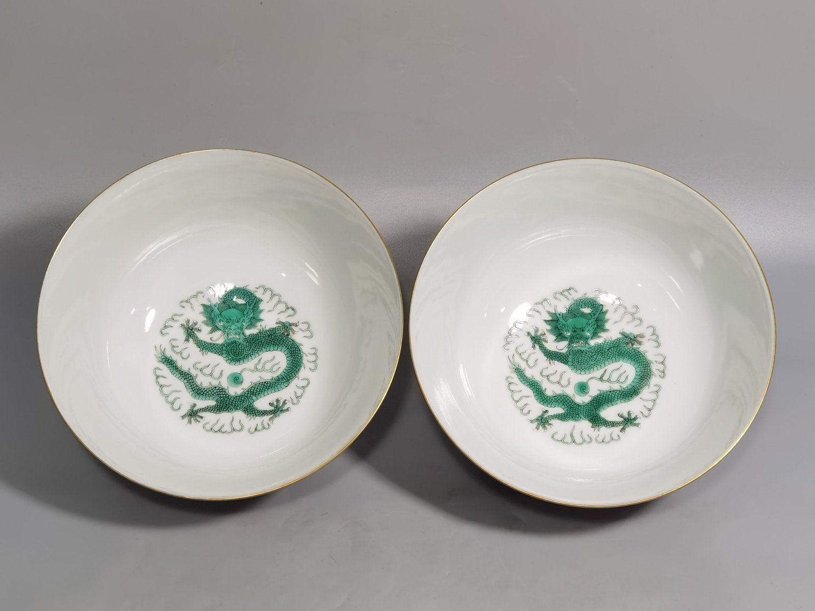 Qing Dynasty Guangxu A pair of yellow and pastel windowed dragon bowls