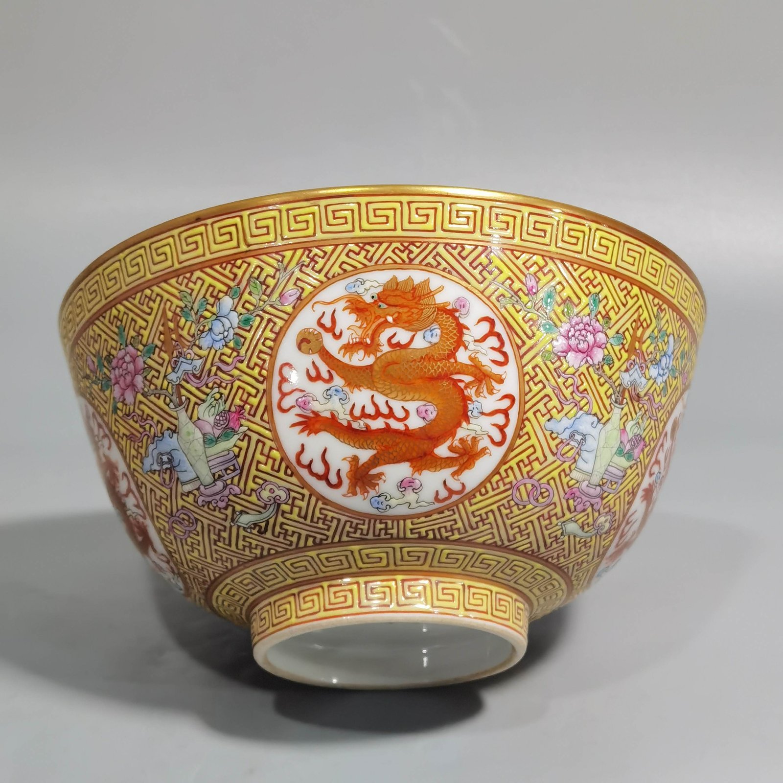 Qing Dynasty Guangxu A pair of yellow and pastel windowed dragon bowls