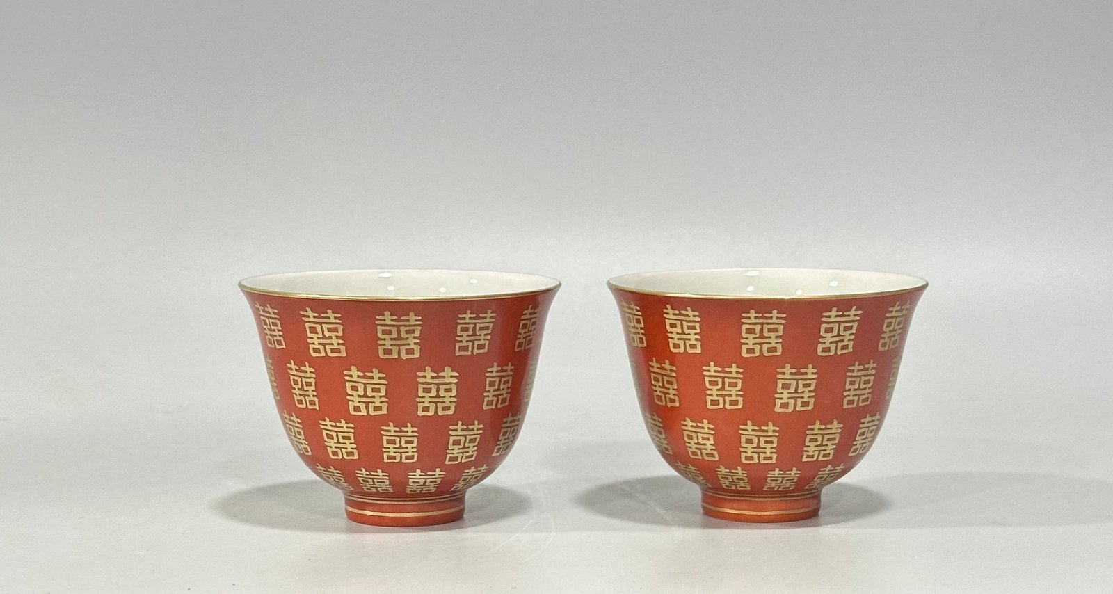 Qing Dynasty Tongzhi Pastel coral red cup with gold double happiness pattern