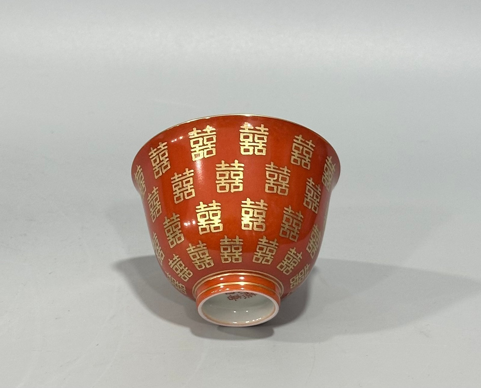 Qing Dynasty Tongzhi Pastel coral red cup with gold double happiness pattern