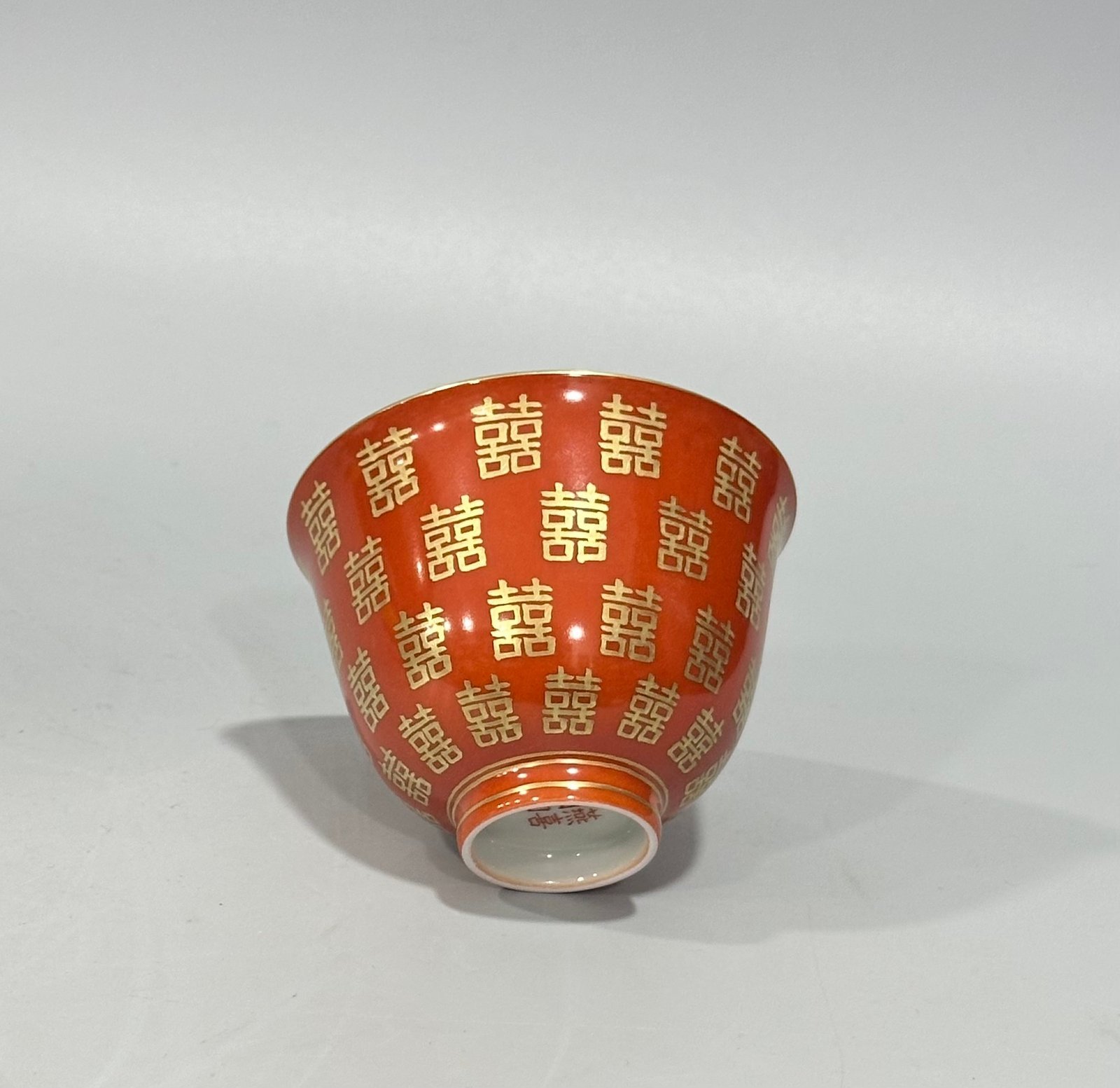 Qing Dynasty Tongzhi Pastel coral red cup with gold double happiness pattern