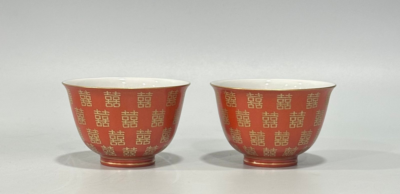 Qing Dynasty Tongzhi Pastel coral red cup with gold double happiness pattern