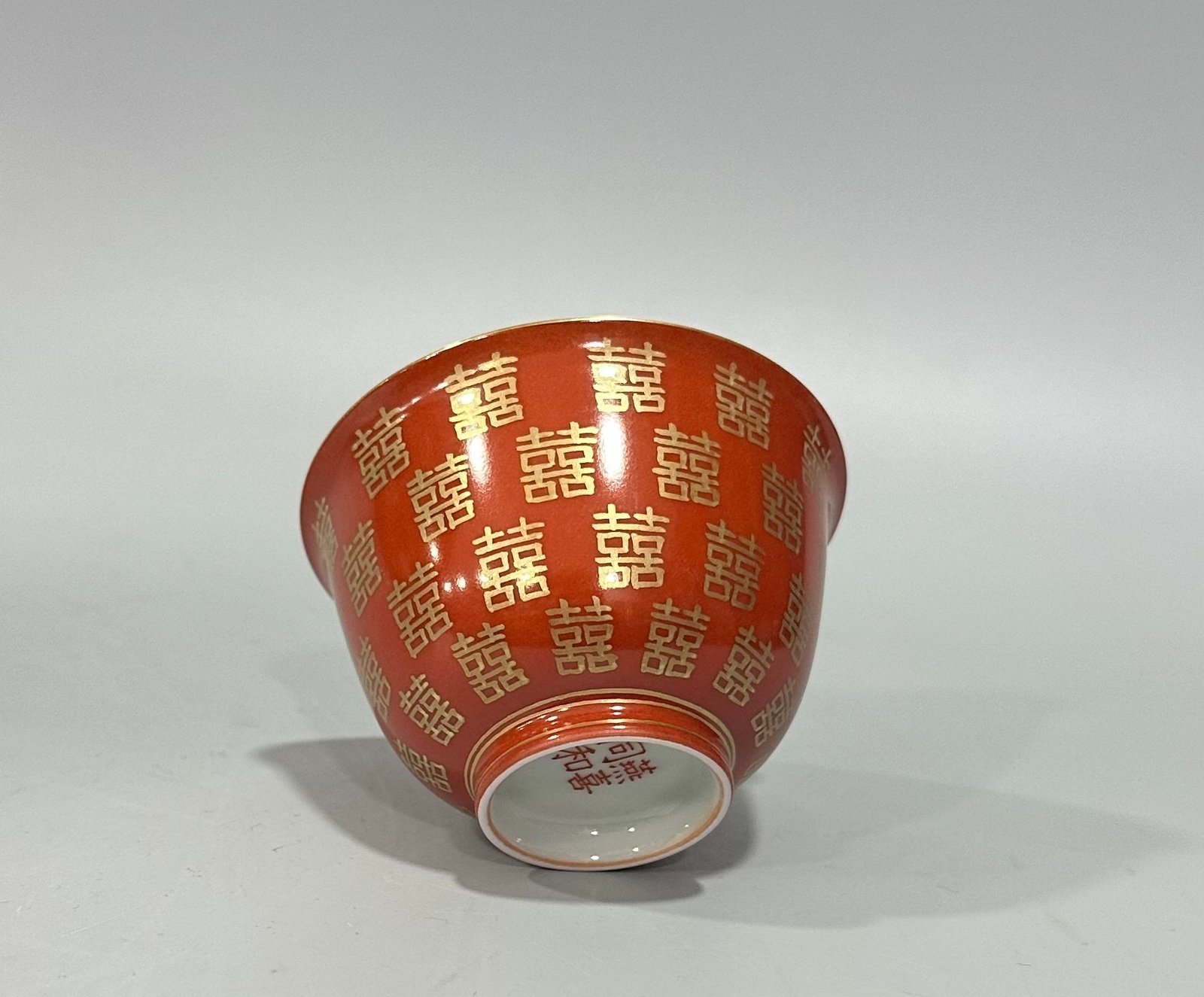 Qing Dynasty Tongzhi Pastel coral red cup with gold double happiness pattern