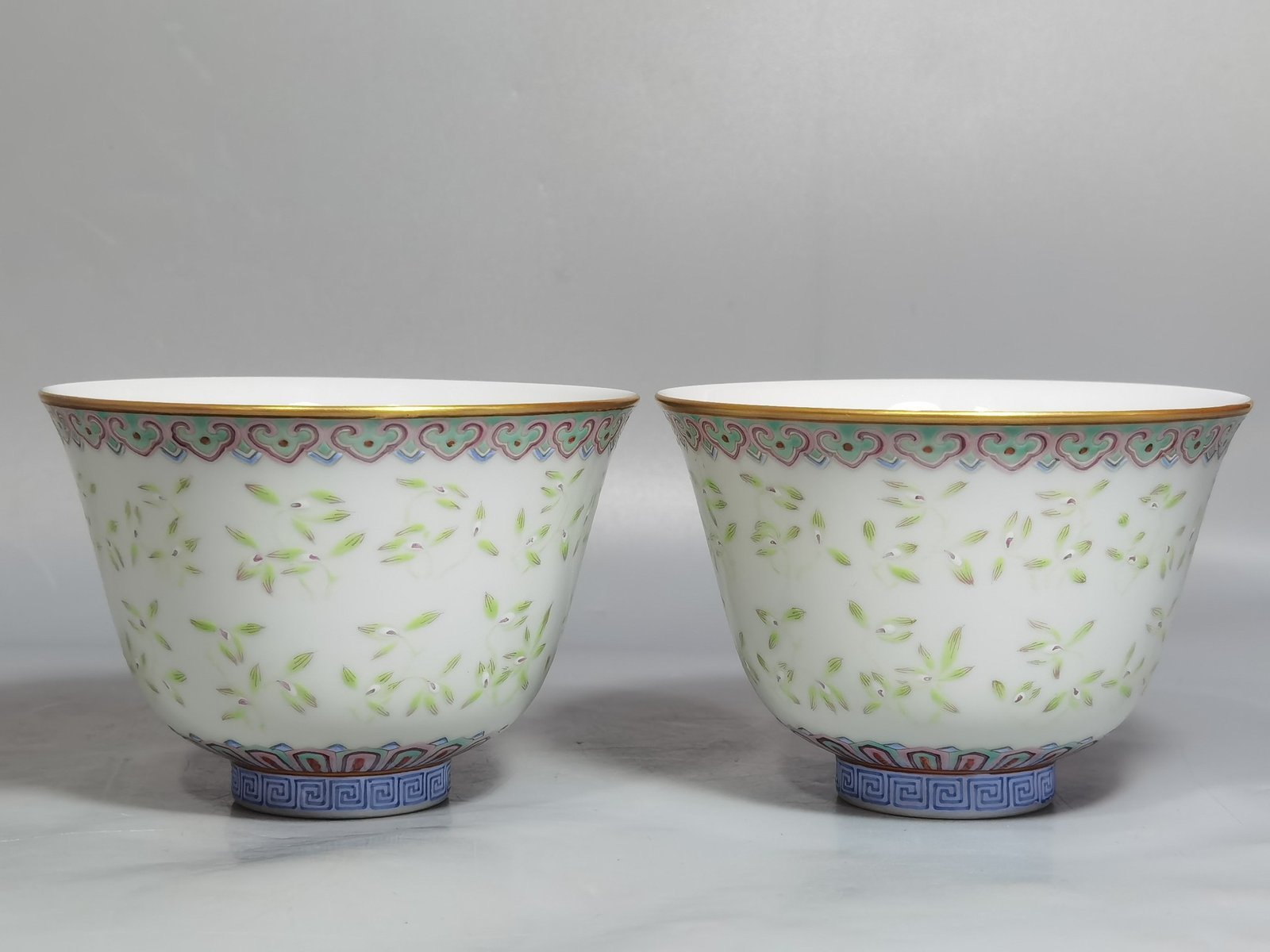 Qing Dynasty Tongzhi A pair of pastel orchid cups