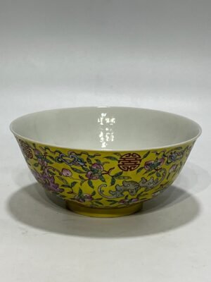 Qing Dynasty Tongzhi famille rose yellow ground longevity bowl