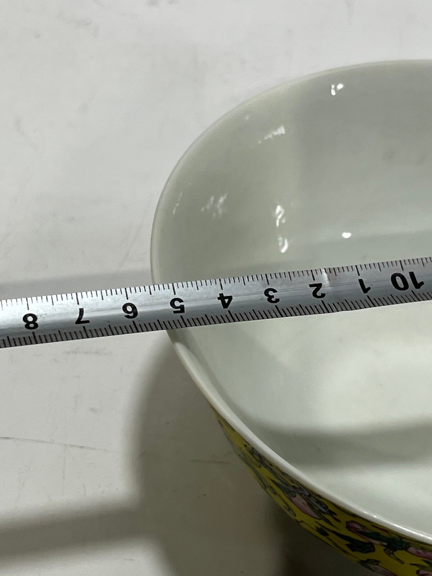 Qing Dynasty Tongzhi famille rose yellow ground longevity bowl