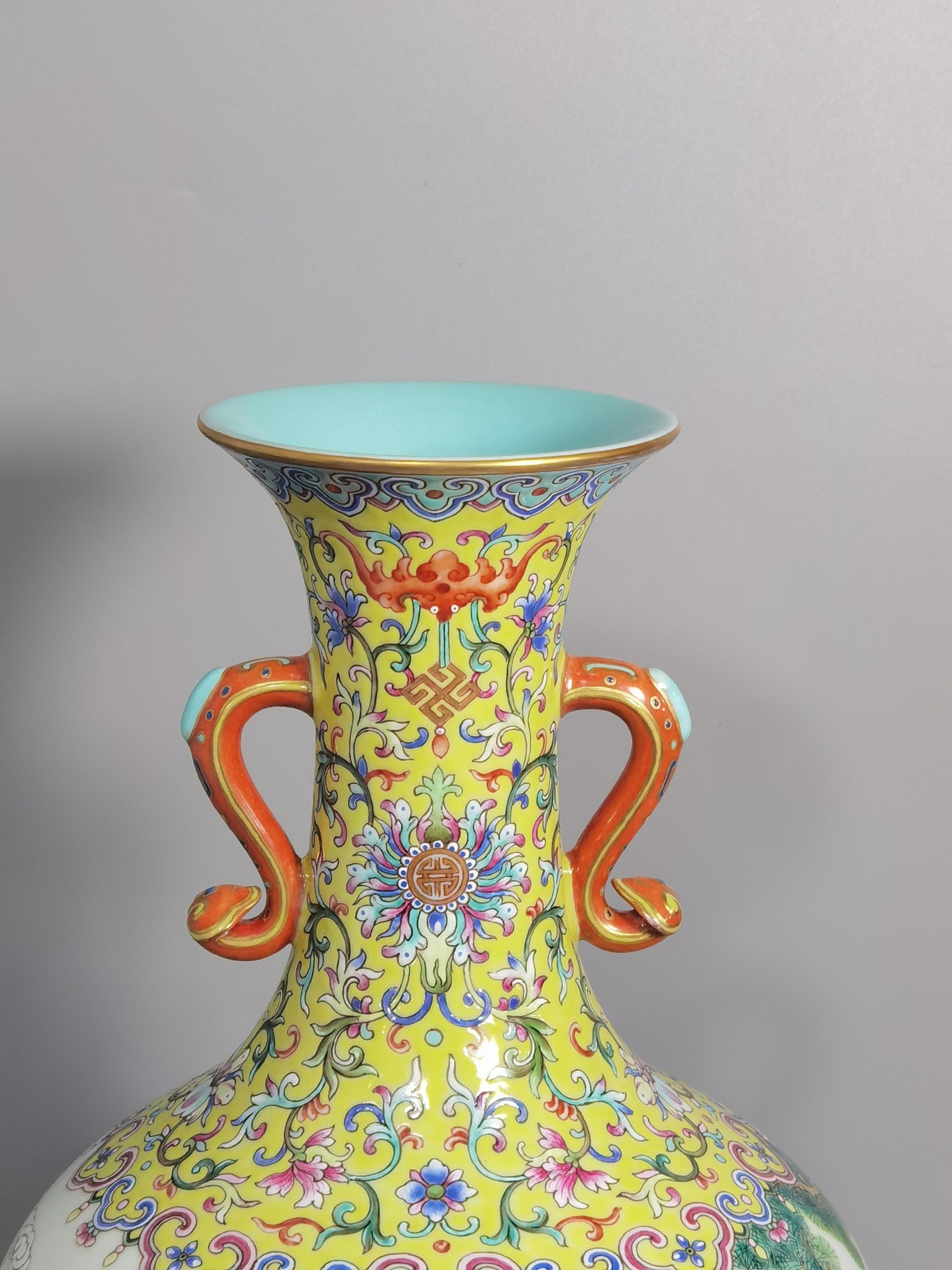 Qing Dynasty Jiaqing pastel upper and lower yellow ground blessing and longevity Ruyi ear vase