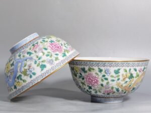 Qing Dynasty Jiaqing pastel double dragons wearing peony flower bowl