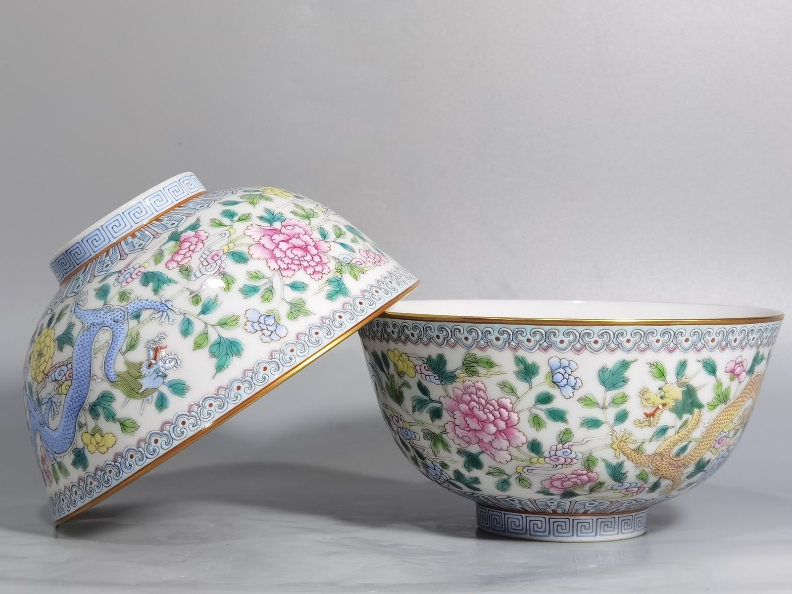 Qing Dynasty Jiaqing pastel double dragons wearing peony flower bowl
