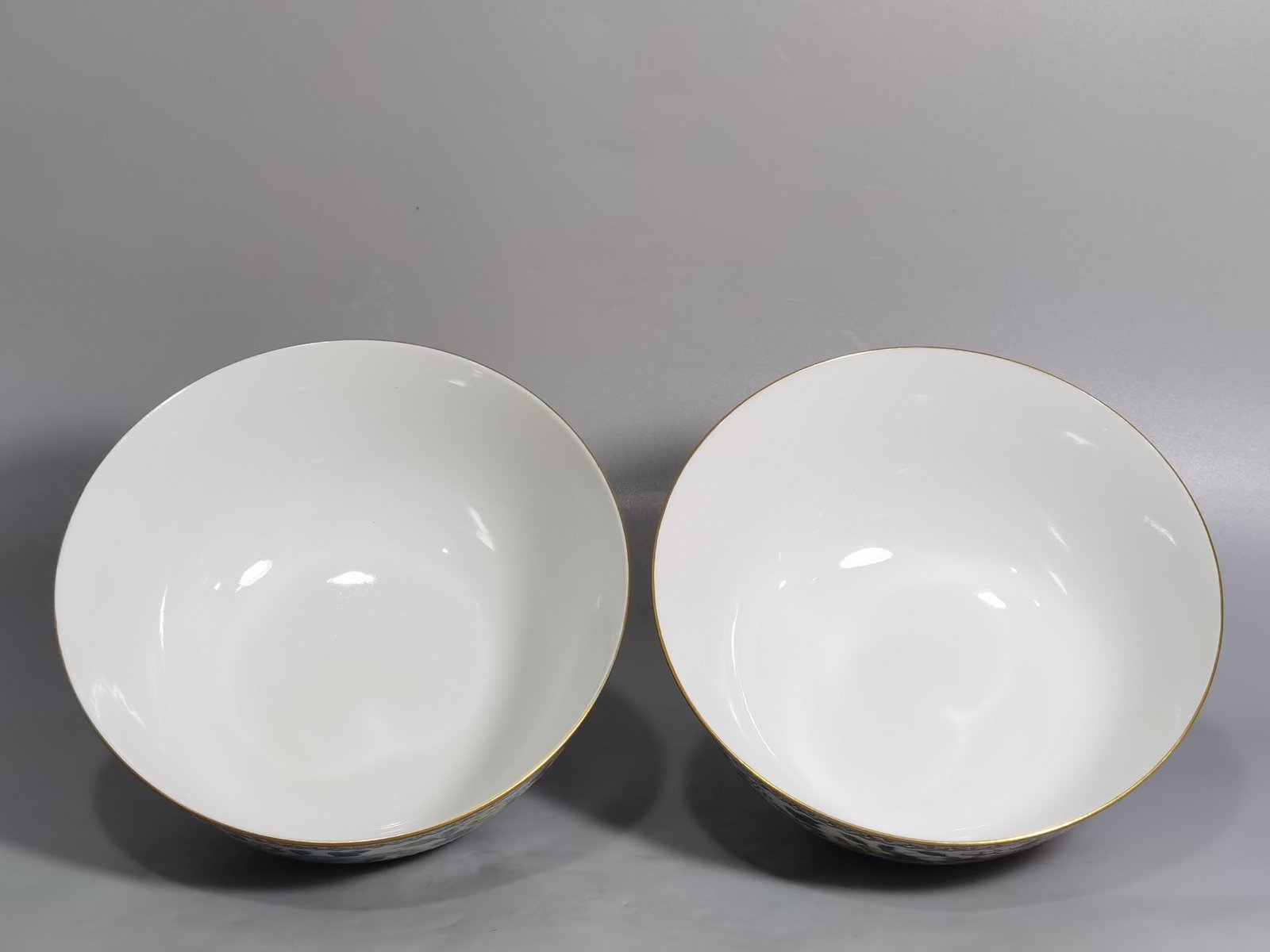 Qing Dynasty Jiaqing pastel double dragons wearing peony flower bowl