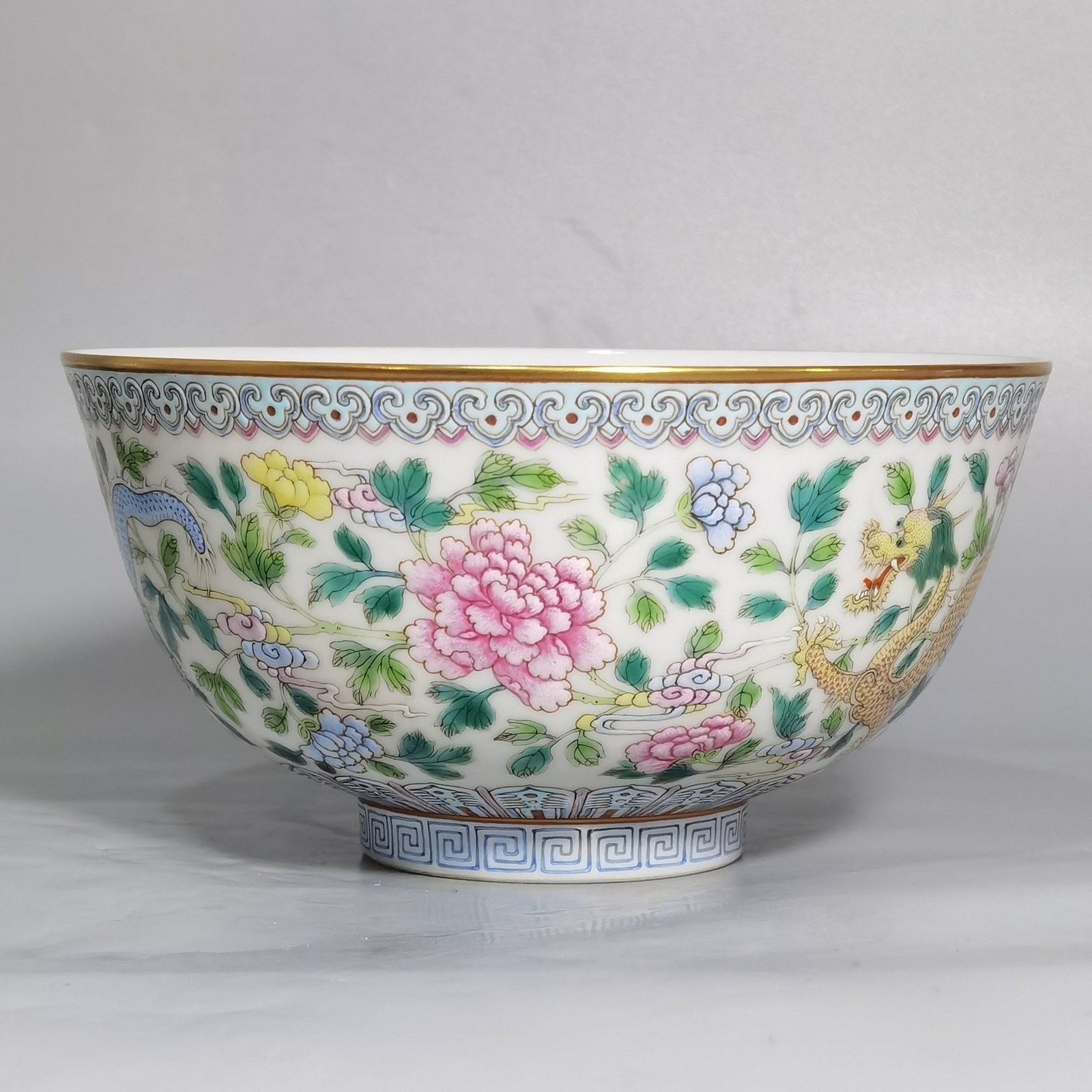 Qing Dynasty Jiaqing pastel double dragons wearing peony flower bowl