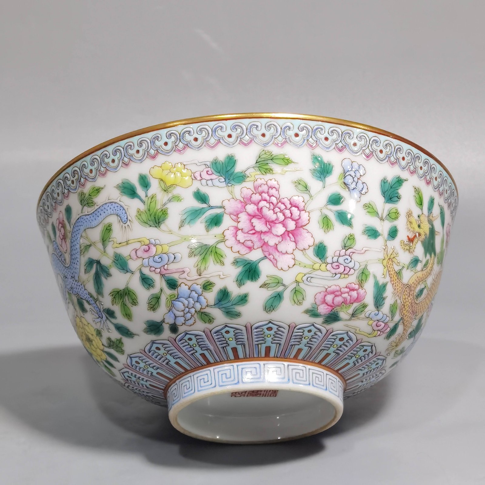 Qing Dynasty Jiaqing pastel double dragons wearing peony flower bowl