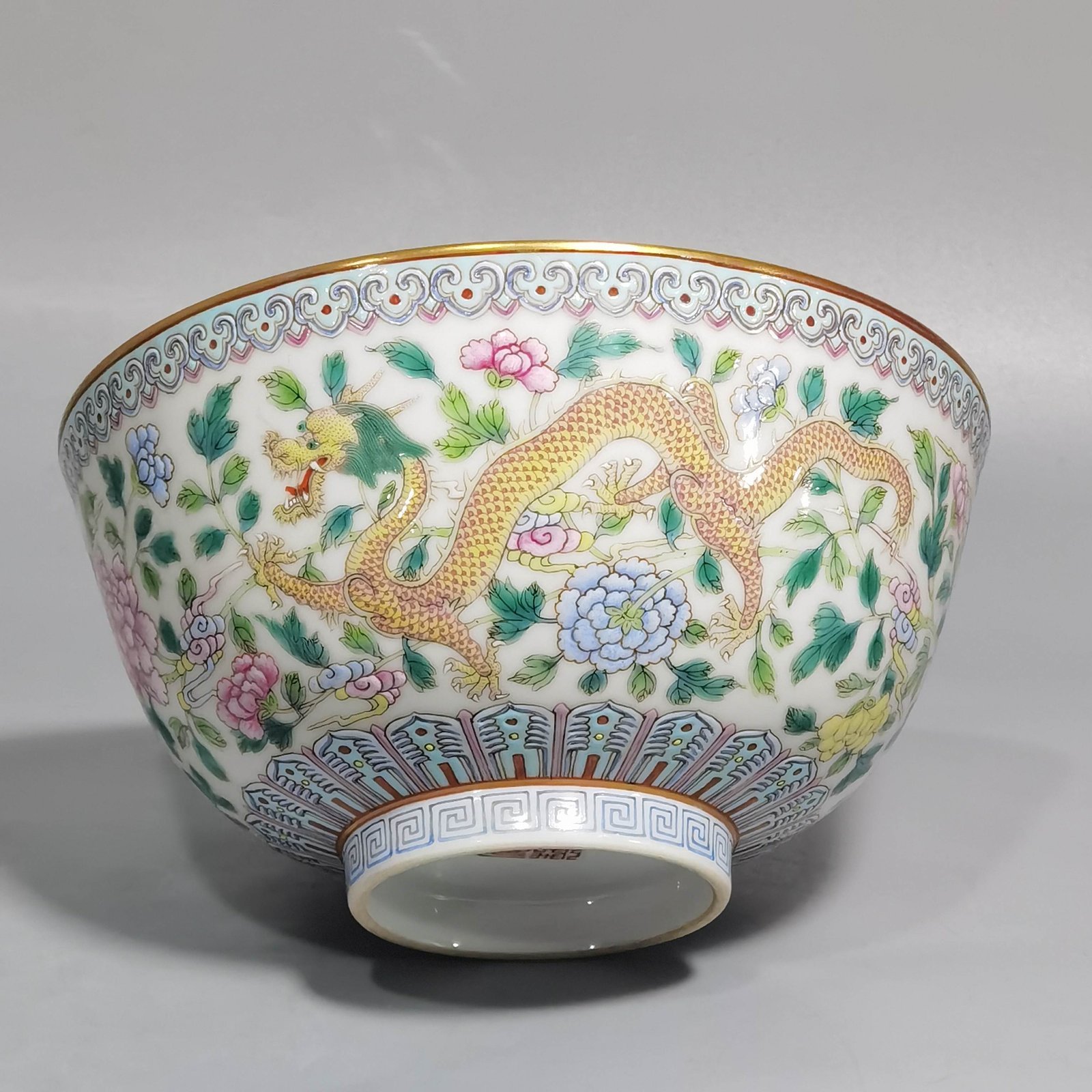 Qing Dynasty Jiaqing pastel double dragons wearing peony flower bowl