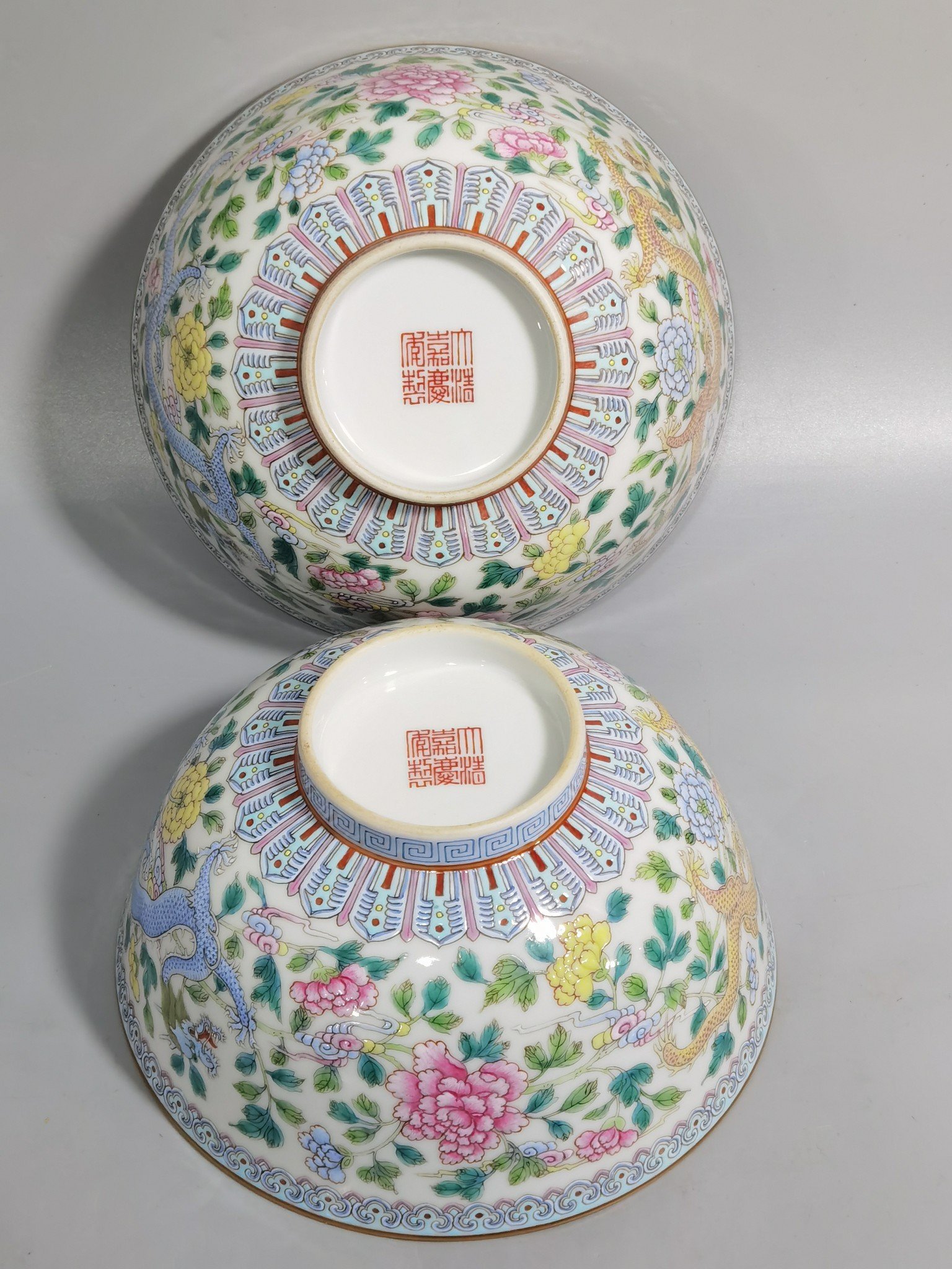 Qing Dynasty Jiaqing pastel double dragons wearing peony flower bowl